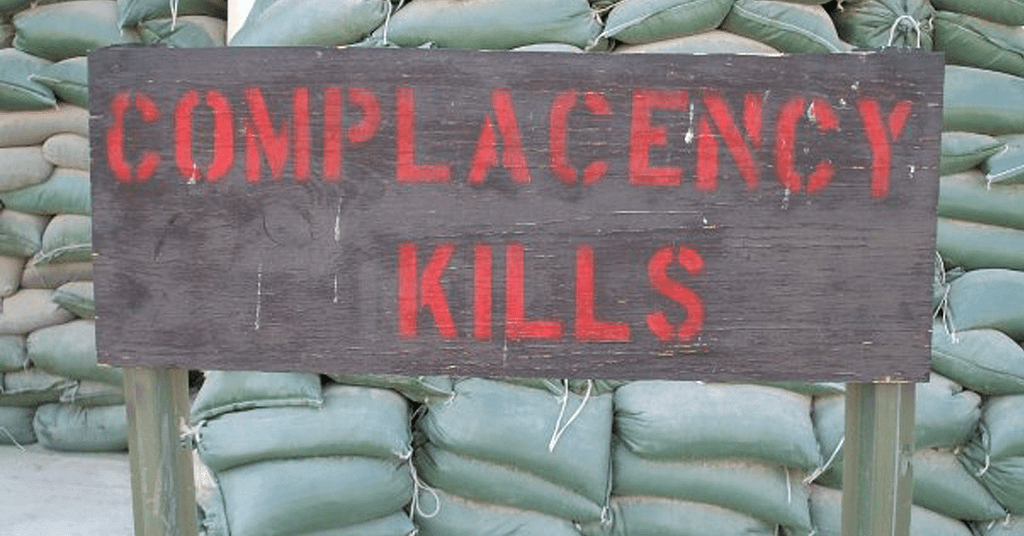 Complacency Kills Sign